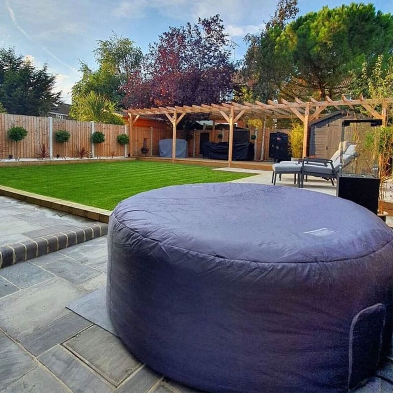 CleverSpa 208cm round thermal hot tub cover fitted on spa in garden patio setting for improved heat retention and outdoor protection